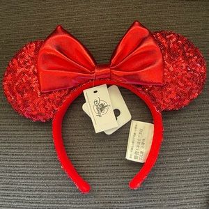 Red Disneyland ears never warn